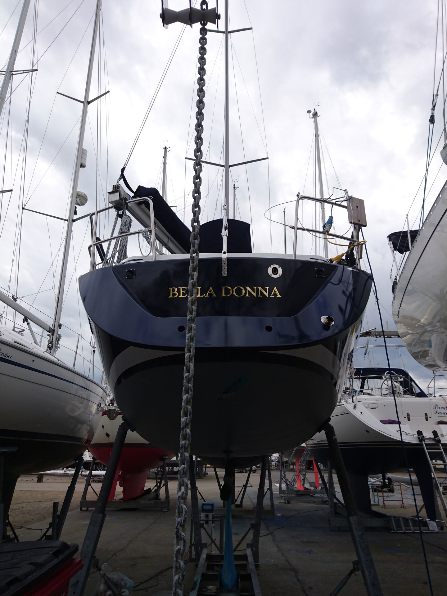 Another sailing yacht transom boat name decal has been applied here by the river Hamble, Southampton.