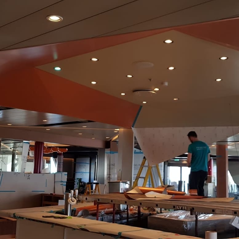 Diamont bar ceiling vinyl installation mid-way